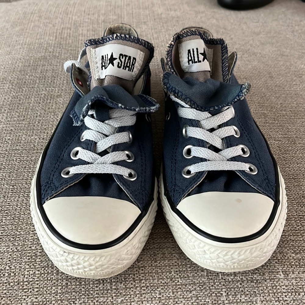 Woman’s double tongue converse